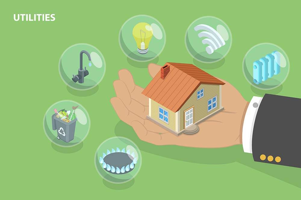 Hand hält ein Haus, umgeben von Symbolen der Versorgungsunternehmen, die die Kosten für Strom, Wasser und Heizung anzeigen